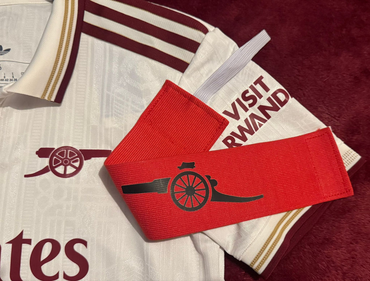 ARM BAND WITH RUTHBECKART CANNON DESIGN - RED (ONE SIZE)