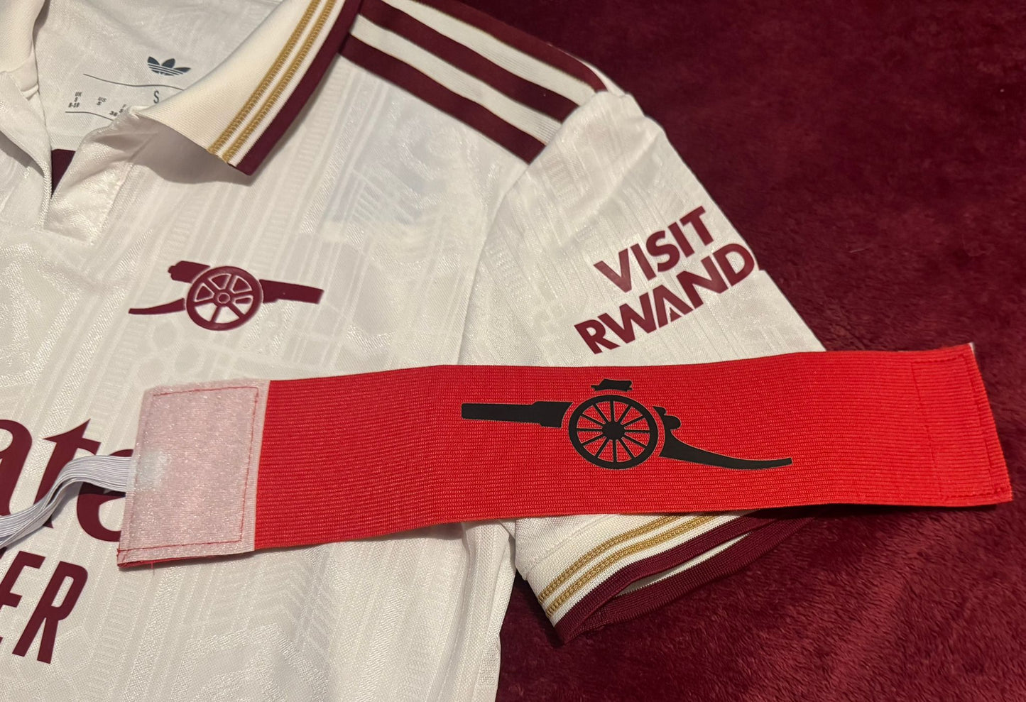 ARM BAND WITH RUTHBECKART CANNON DESIGN - RED (ONE SIZE)