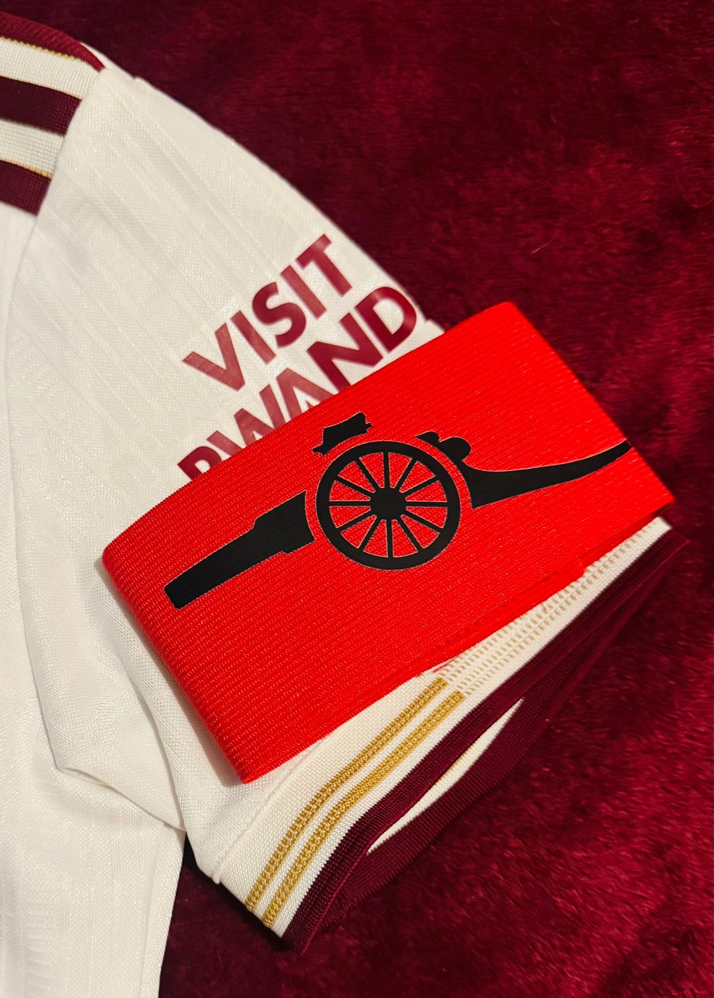 ARM BAND WITH RUTHBECKART CANNON DESIGN - RED (ONE SIZE)
